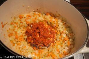Carmalizing Tomato Paste and Anchovy Paste for Short Rib Ragu in Dutch Oven
