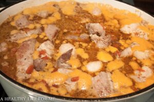 Add all ingredients to Dutch Oven and simmer