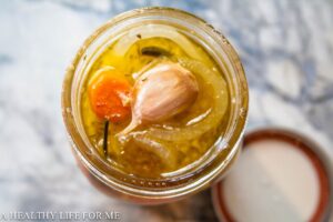 Pickled Pepper Mix filled in Canning Jars before Processing in Hot Water Bath