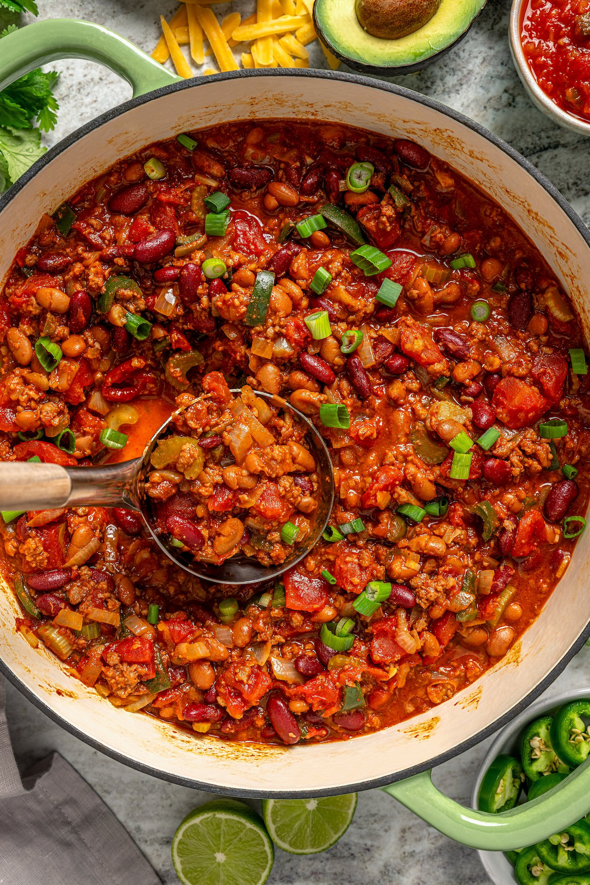 Grabbing a spoonful of the chunky turkey chili.