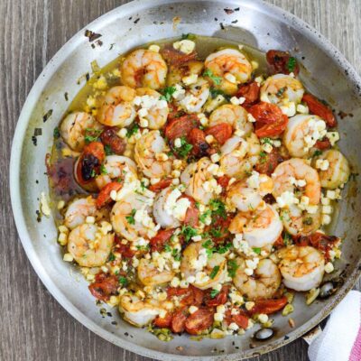 Baked Shrimp with Tomato and Feta is an easy, delicious, gluten free and healthy dinner that is made in one skillet and ready in less than 30 minutes | ahealthylifeforme.com