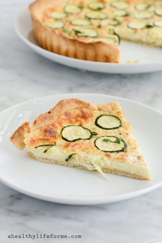 Zucchini Cheese Tart is a creamy, salty, decadent slice of heaven. An awesome way to enjoy your summer zucchini | ahealthylifeforme.com