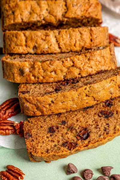 Sliced zucchini loaf with gooey chocolate chips.