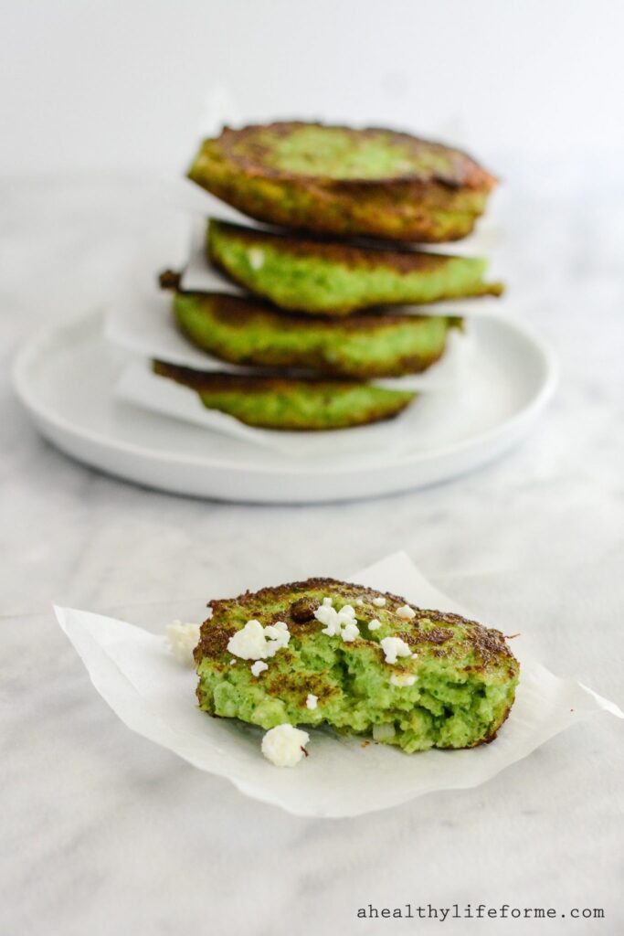 Broccoli Feta Fritters are the perfect way to enjoy your Broccoli.  Feta makes these green little discs a little salty and creamy and a quick fry gives them a nice crunchy edge. | ahealthylifeforme.com