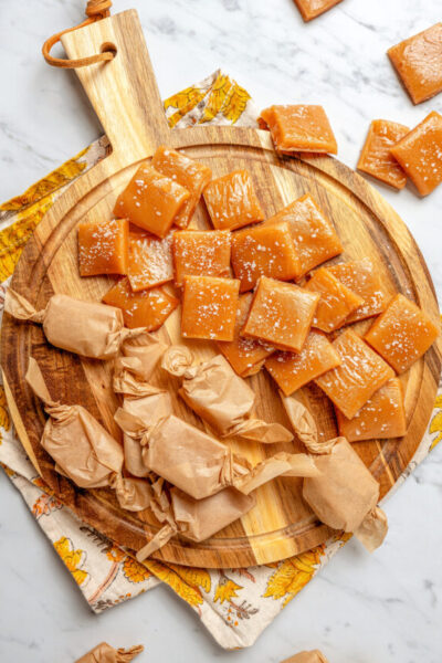 Whiskey salted caramels wrapped in parchment papers.