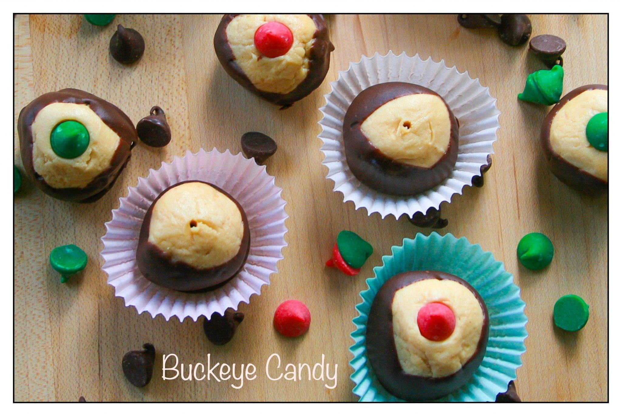 Buckeyes topped with Christmas colored chocolate chips