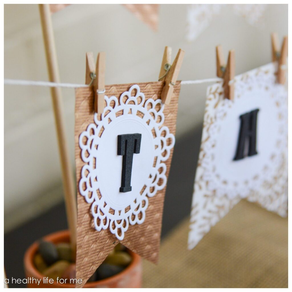 Decorating Foyer Table for Thanksgiving using Banner and Natural Elements