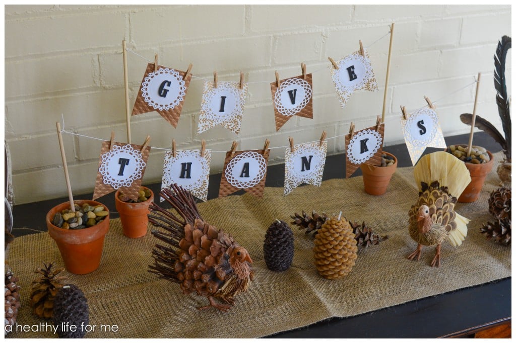 Decorating Foyer Table with Banner and Natural Elements