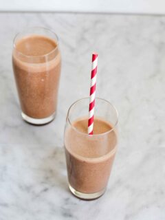 Coffee Banana Breakfast Smoothie in two glasses.