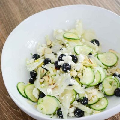 Shaved Fennel Zucchini Salad topped with Blueberries Feta Almonds and Lemon Vinaigrette | ahealthylifeforme.com