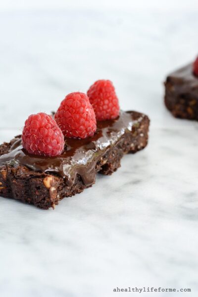 Chocolate Walnut Tart with Raspberries is a triple dose of chocolate that makes this one incredible dessert. I kept the recipe clean, so this tart is gluten free, dairy free and paleo friendly.
