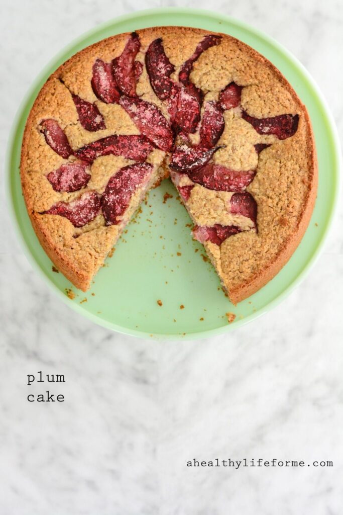 Plum Cake is a moist delicious cake packed full of fresh fruit. Gluten Free, Dairy Free, Paleo Friendly with zero granulated sugar this cake is a great way to enjoy the other summer stone fruit, plums. | ahealthylifeforme.com