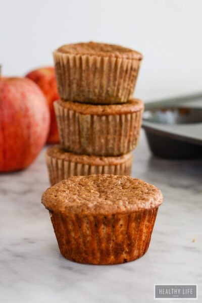 A stack of apple cinnamon protein muffins.