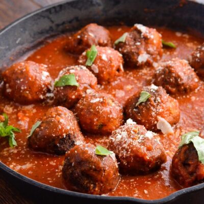 This Eggplant Meatball recipe is made with roasted eggplant, creamy salty parmesan cheese, Italian breadcrumbs and fresh basil and parsley packed into a balls, and then lightly fried, served topped with marinara sauce. | ahealthylifeforme.com