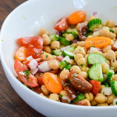 This Lemony Chickpea Salad features bright colors and equally bright flavors. A hearty recipe that is quick to assemble and loaded with healthy ingredients. This is a diary free recipe making it a perfect choice to bring to your next barbecue gluten free recipe | ahealthylifeforme.com