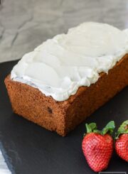Gluten Free yellow cake with fresh banana flavor topped with a classic white frosting makes the perfect dessert cake or decadent breakfast cake.
