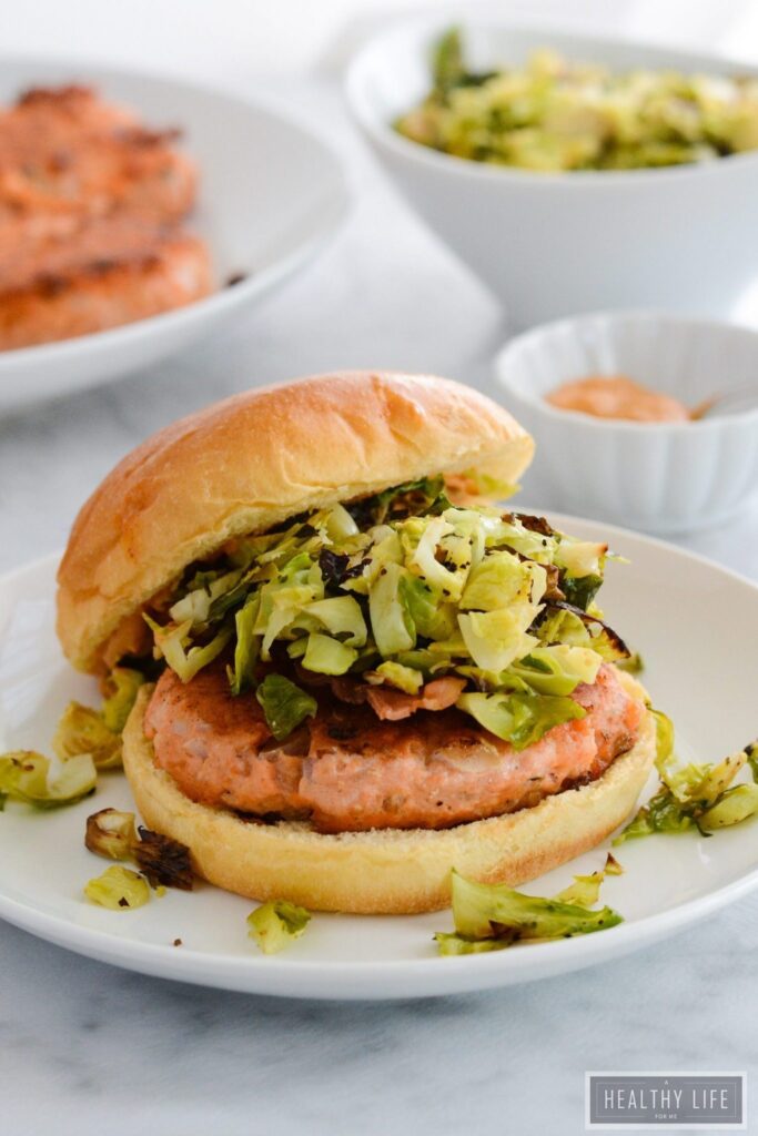 Spicy Salmon Burger Recipe with Roasted Brussels Sprout Slaw | ahealthylifeforme.com
