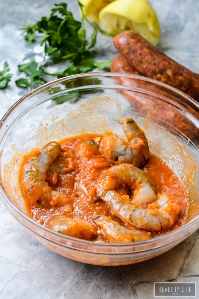 Spicy Shrimp Chorizo Stew is the perfect easy recipe with a bit of kick to liven up your weeknight dinner. Layers of shrimp, chorizo, spice, citrus and couscous come together for a healthy gluten free dish. | ahealthylifeforme.com