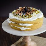 Gluten Free Fig and Cream Cake Coconut cream is layered between three perfectly light and moist egg white cakes. Then topped with fresh seasonal figs, crumbled pistachio and a drizzle of golden honey | ahealthylifeforme.com
