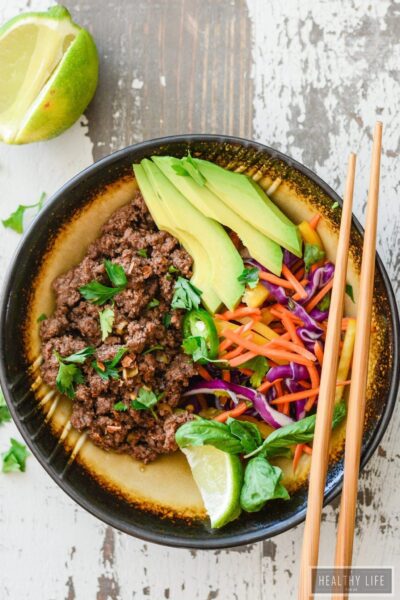 This Asian Beef Rainbow Salad is ready to eat in minutes, is loaded with tons of raw good for you vegetables, and perfectly seasoned and cooked ground beef | ahealthylifeforme.com