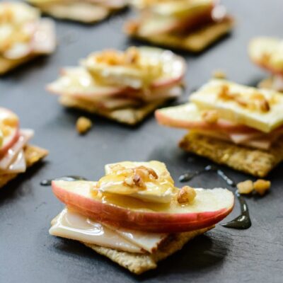 Turkey Apple Brie Bites are made with a cracker base and a honey drizzle topping. These one-bite morsels are the perfect light lunch, snack or party appetizer | ahealthylifeforme.com