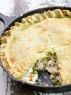 Cooked chicken pot pie with a slice missing