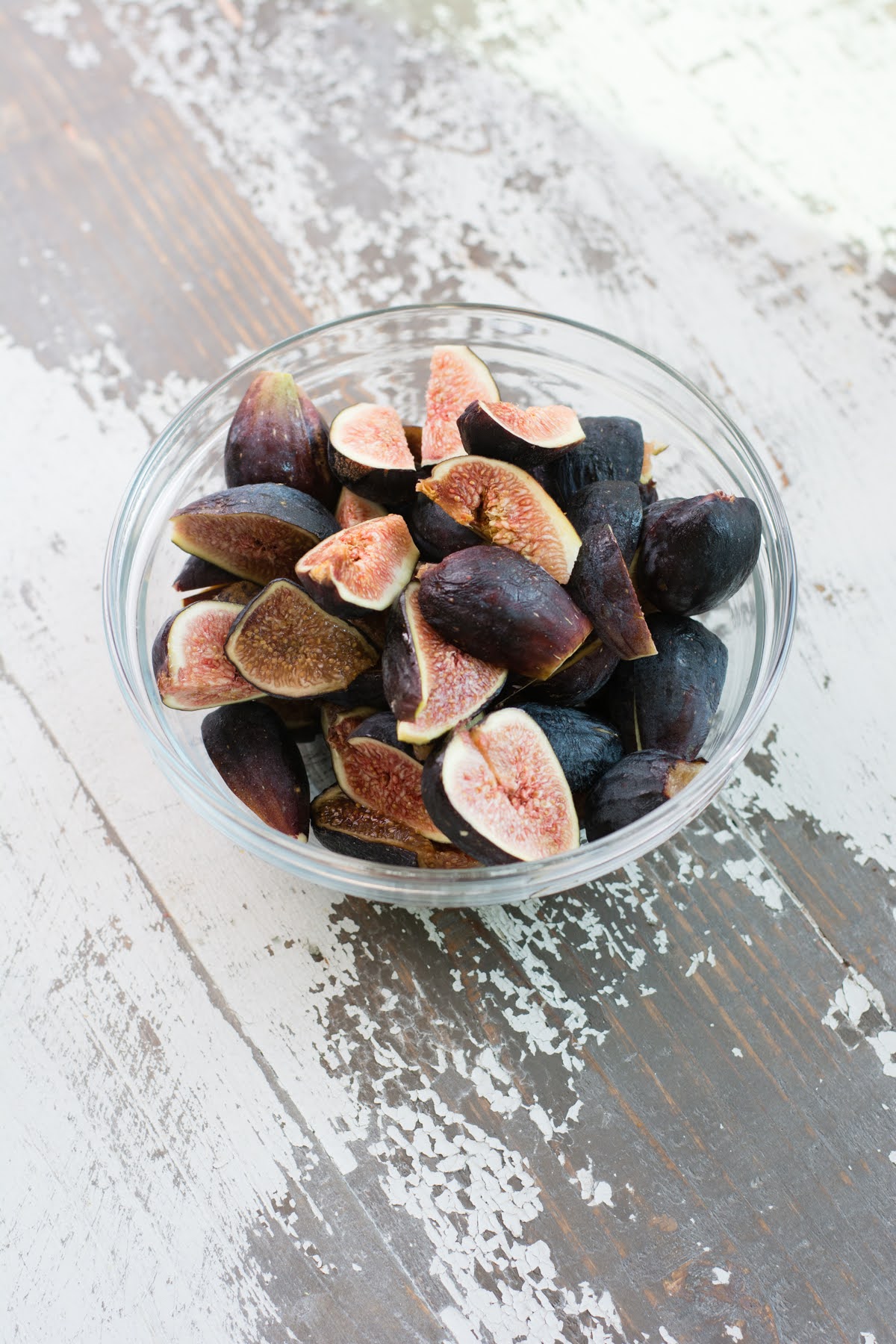 A bowl of cut figs