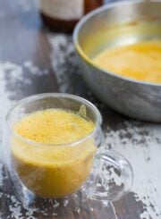 Turmeric milk with maca powder and spices.