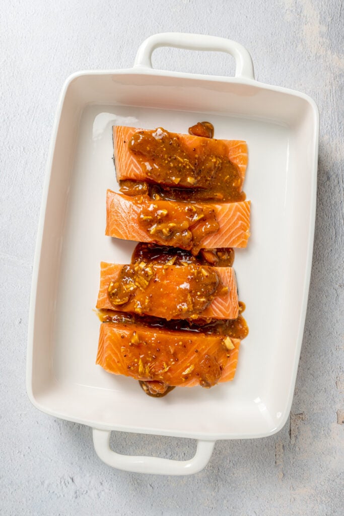 Salmon filets topped with glaze.
