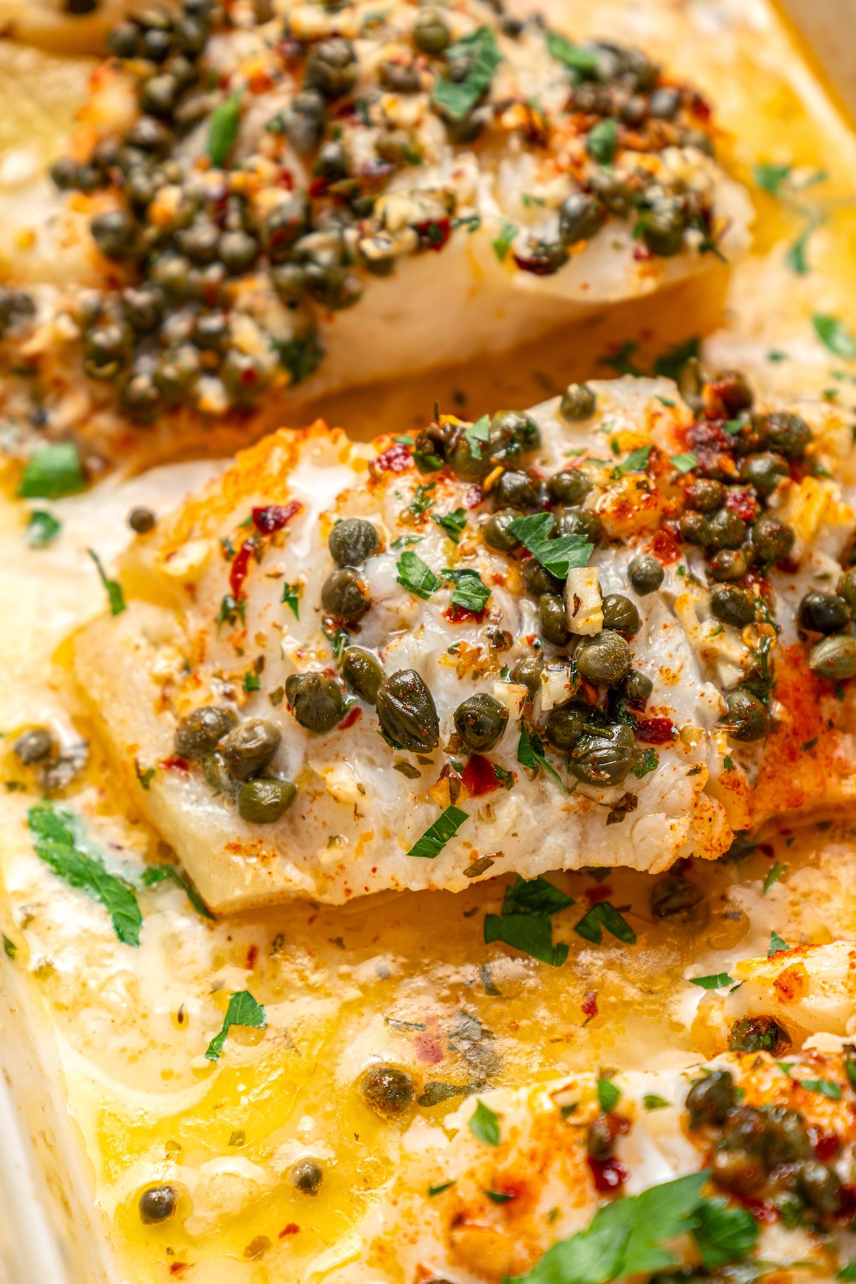 Garlic-herb-caper sauce baked with fish.