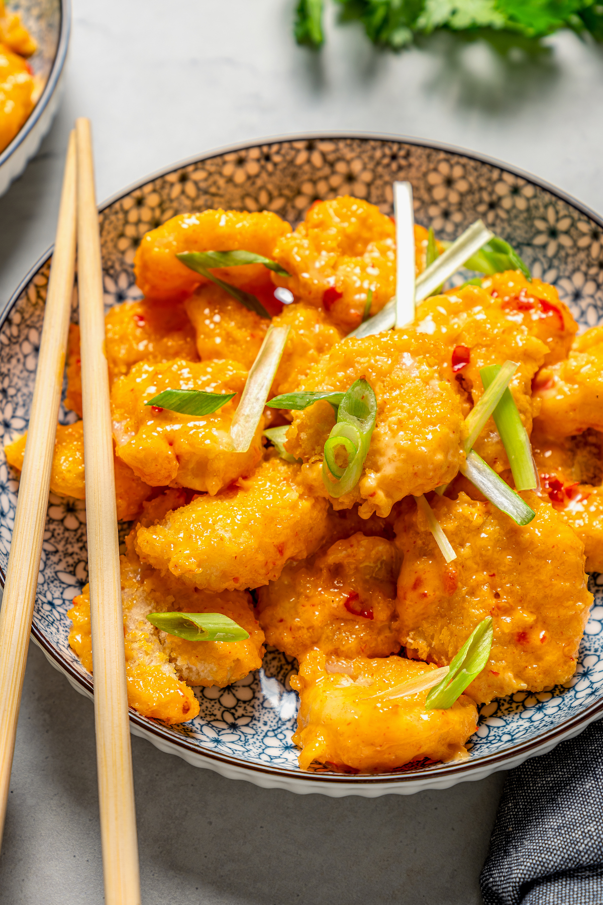 Bowl of crispy shrimp with the spicy sauce. 