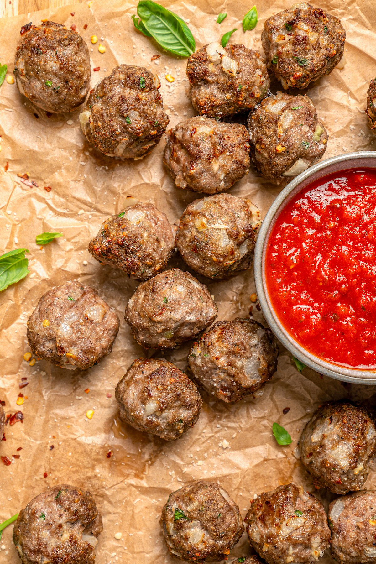 Air fryer meatballs with tomato sauce on the side. 