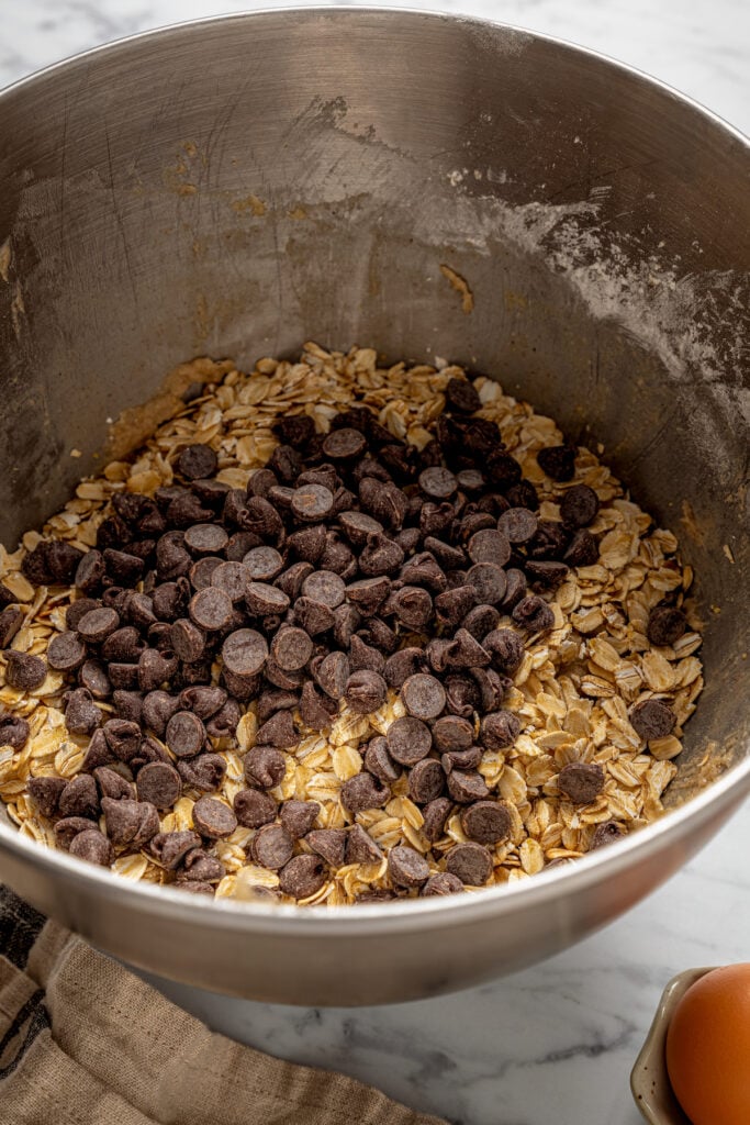 Folding the chocolate chips into the dough. 
